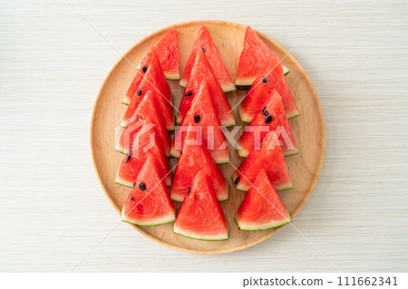 fresh watermelon sliced on plate fresh watermelon sliced on plate 111662341