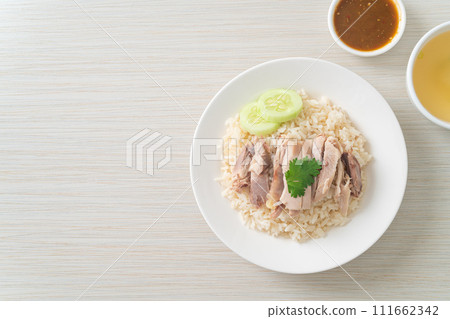 Hainanese Chicken Rice or steamed rice with chicken Hainanese Chicken Rice or steamed rice with chicken 111662342