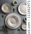 Empty plates on table flat lay. ai generated 111662973