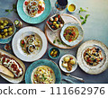 mediterranean, food. flat lay of table setting with variety of antipasti ai generated 111662976