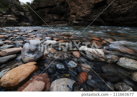 stones in mountain river in mountains in Aksu canyon in Kazakhstan stones in mountain river in mountains in Aksu canyon in Kazakhstan 111663677