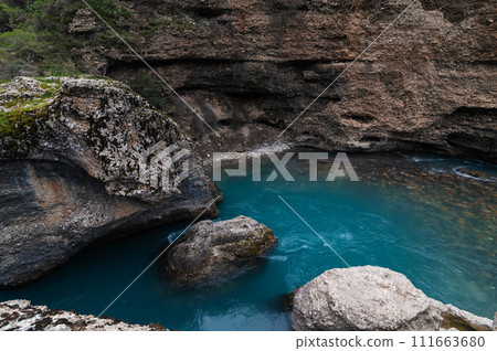 blue water in river in mountains in Aksu canyon in Kazakhstan in spring 111663680