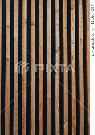 wooden background with slats and boards for decorative exterior decoration 111664297
