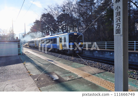 Diesel car entering the platform at Kiyosato Station Diesel car entering the platform at Kiyosato Station 111666749