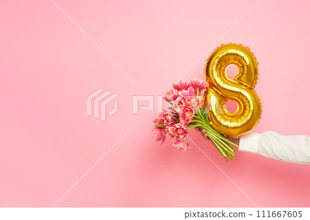 Man hand with gold balloon shape 8 Man hand with gold balloon shape 8 111667605