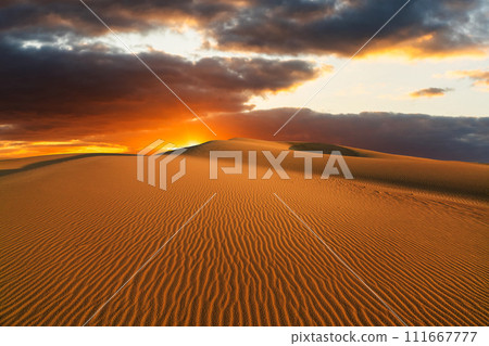 Sunset over the sand dunes in the desert. Rub' al Khali desert 111667777