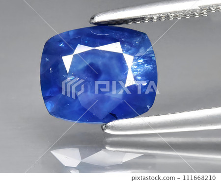 natural blue sapphire gem on the background natural blue sapphire gem on the background 111668210