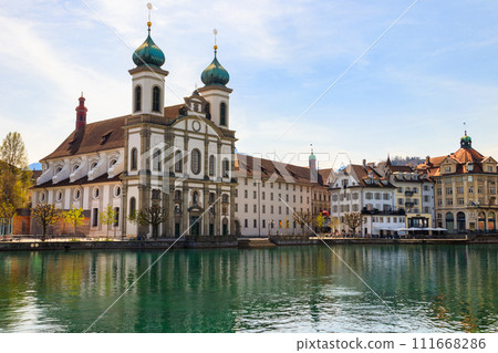 View of Jesuit church and the Reuss river in Lucerne, Switzerland View of Jesuit church and the Reuss river in Lucerne, Switzerland 111668286