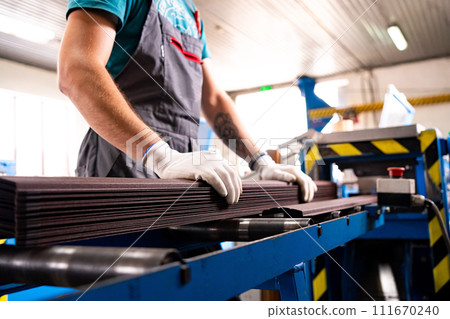 Worker at factory measures works metal production industrial 111670240