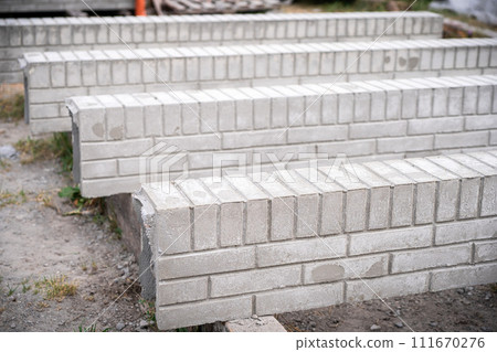 Brick fence pillar column isolated on white background Brick fence pillar column isolated on white background 111670276