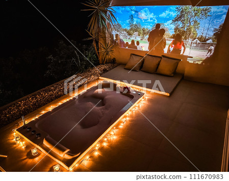 Night jacuzzi bathtub with movie projection in Doi Chang in Chiang Rai, Thailand Night jacuzzi bathtub with movie projection in Doi Chang in Chiang Rai, Thailand 111670983
