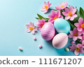 Colorful Easter eggs and blooming pink flowers on light blue background. 111671207