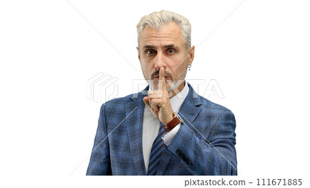 A man, close-up, on a white background, shows a sign of silence 111671885
