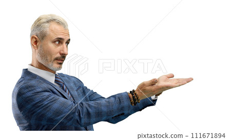 A man, close-up, on a white background, points to the side A man, close-up, on a white background, points to the side 111671894