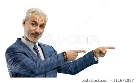 A man, close-up, on a white background, points to the side 111671897