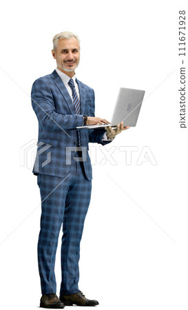 A man, full-length, on a white background, uses a laptop 111671928