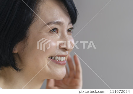 Beauty image portrait of a woman in her early 50s 111672034
