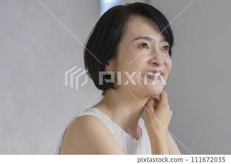 Beauty image portrait of a woman in her early 50s 111672035