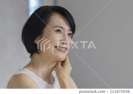 Beauty image portrait of a woman in her early 50s 111672036