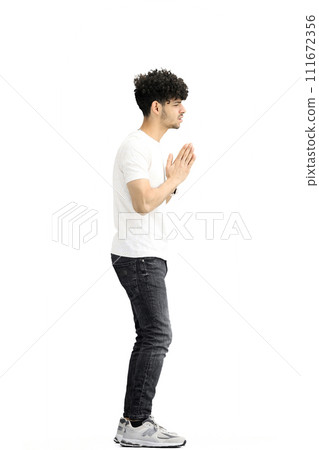 A man, on a white background, in full height, pleads 111672356