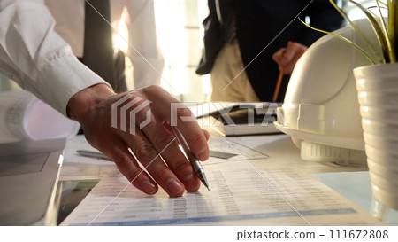 Working on a business sales report 111672808