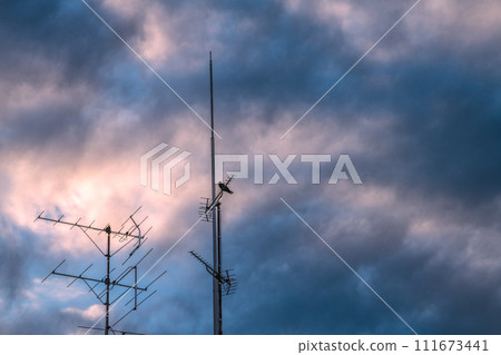 Tokyo cityscape in Japan Antenna and clouds installed on the roof of an apartment building... What will be the TV in the future... Tokyo cityscape in Japan Antenna and clouds installed on the roof of an apartment building... What will be the TV in the future... 111673441