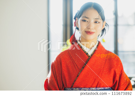 Red furisode and hakama Red furisode and hakama 111673892