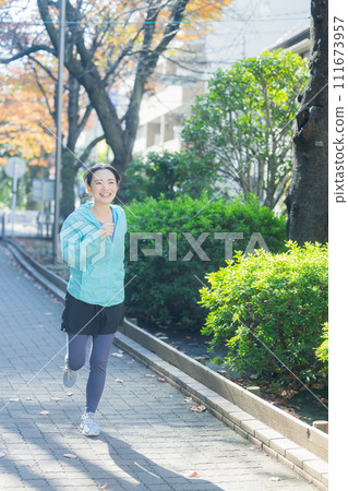 Young woman running Young woman running 111673957