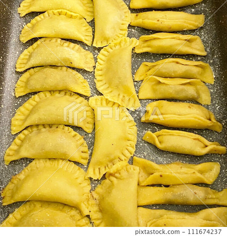 Italian pasta ravioli  111674237