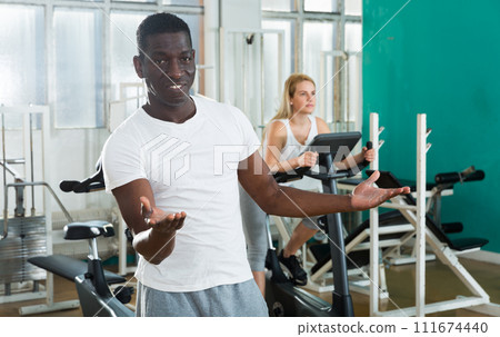 Cheerful African man at gym Cheerful African man at gym 111674440