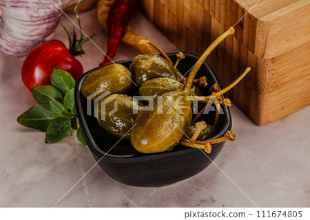 Marinated Caper Berries snack appetiser 111674805