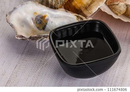 Oyster sauce in the bowl 111674806