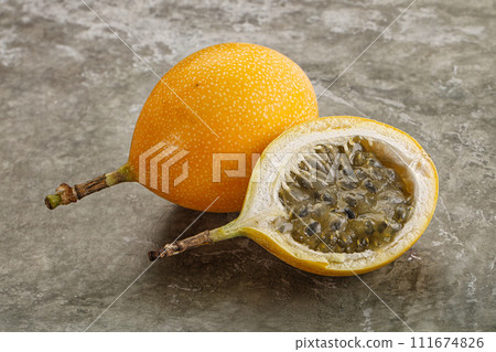 Yellow granadilla with cut half Yellow granadilla with cut half 111674826