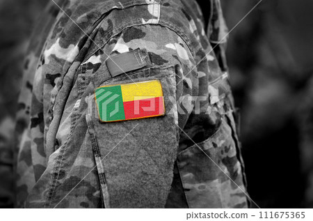 Flag of Benin on soldiers arm (collage). Flag of Benin on soldiers arm (collage). 111675365