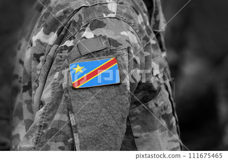Democratic Republic of the Congo flag on soldiers arm. Army, troops, military, Africa (collage). 111675465