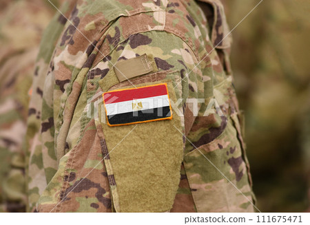 Egypt flag on soldiers arm (collage). Egypt flag on soldiers arm (collage). 111675471