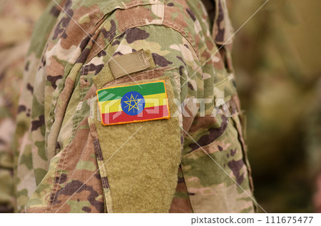 Ethiopia flag on soldiers arm. Ethiopia troops (collage) 111675477