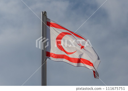 flag of the Turkish Republic of Northern Cyprus against the sky 3 111675751