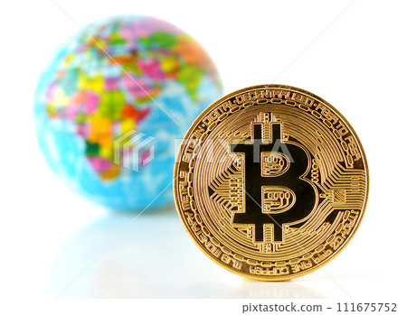 Bitcoin concept. World economy concept. New world currency. Golden coin bitcoin and globe. 111675752