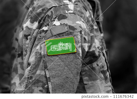 Flag of Hamas on soldier arm. Flag of Hamas on military uniforms (collage). Flag of Hamas on soldier arm. Flag of Hamas on military uniforms (collage). 111676342