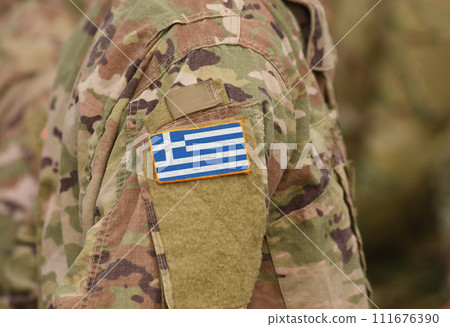 Greece flag on soldiers arm (collage). Greece flag on soldiers arm (collage). 111676390