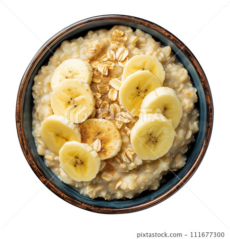 Oatmeal with banana, top view 111677300