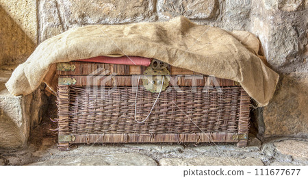 Old braided antique chest and burlap. Retro style Old braided antique chest and burlap. Retro style 111677677