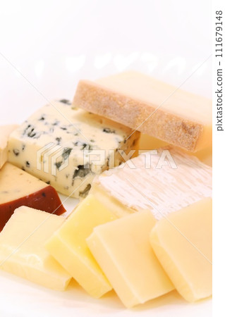 Assorted cheese bright background gouda cheddar etc. Assorted cheese bright background gouda cheddar etc. 111679148
