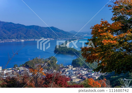 Collaborative scene of autumn leaves and Amanohashidate overlooking from the observation deck Collaborative scene of autumn leaves and Amanohashidate overlooking from the observation deck 111680742
