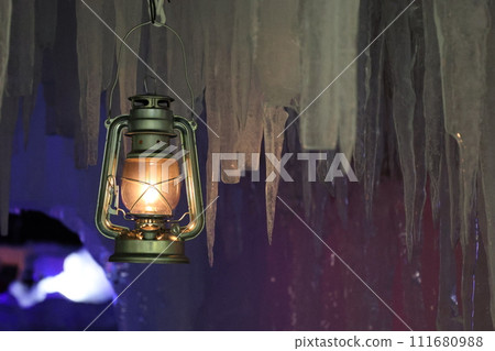 An artificial lantern inside an icicle cave An artificial lantern inside an icicle cave 111680988