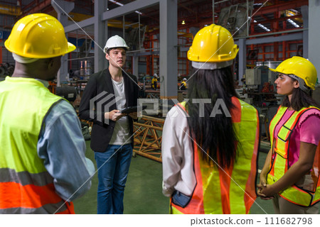 Warehouse safety meeting, people with hardhat. Industrial teamwork. 111682798
