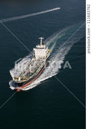 Chemical ship passing through Kurushima Kaikyo Bridge Chemical ship passing through Kurushima Kaikyo Bridge 111683762