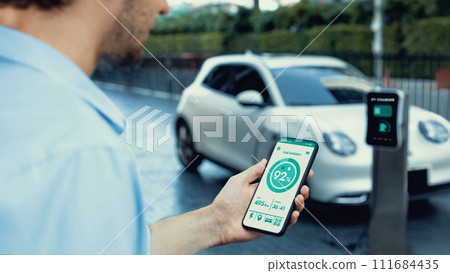 Smartphone display battery status interface by smart EV app. Peruse 111684435