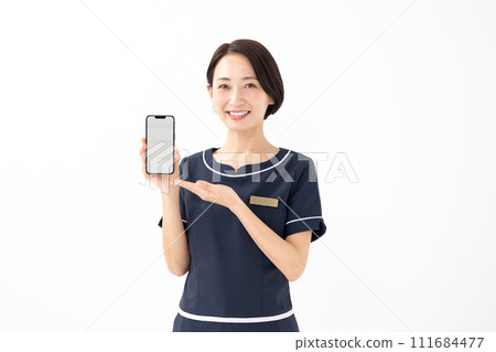 Female uniform esthetician hand held Female uniform esthetician hand held 111684477